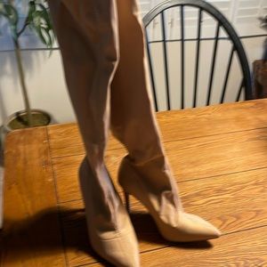 Thigh high heeled boots